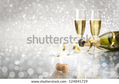 Toast champagne New Year, silver background
