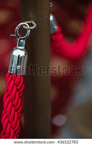 Barrier with red rope