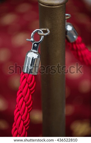 Barrier with red rope