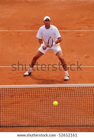 BUCHAREST, ROMANIA MAY 8: Romania\'s Horia Tecau waits to return the ball during the Davis Cup meeting between Romania and Ukraine at the BNR Arenas on May 8, 2010 in Bucharest, Romania.