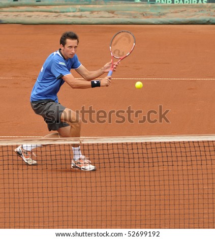 BUCHAREST, ROMANIA - MAY 9:  Ukraine\'s Sergiy Stakhovsky is performing a backhand during the fourth match of the Davis Cup meeting between Romania and Ukraine at the BNR Arenas on May 9, 2010 in Bucharest, Romania.