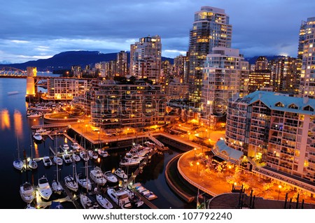 Night scene of modern buildings in vancouver downtown, british columbia, canada