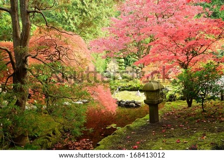walking in Japanese Garden of the national historical site Butchart Gardens, Vancouver island, British Columbia, Canada