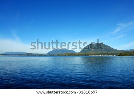 View of sea and mountains in tofino, pacific rim natioinal park, vancouver island, british columbia, canada