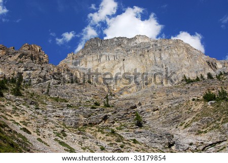 Steep rocky cliff in cory pass, banff national park, alberta, canada