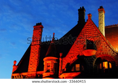 Night scene of the roof of historic craigdarroch castle (built in 1890) in downtown victoria, british columbia, canada