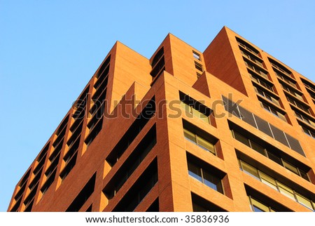 A neat high rise office building under the blue sky in downtown edmonton, alberta, canada