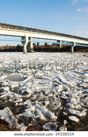 Spring view of north saskatchewan river with melting ice, edmonton, alberta, canada