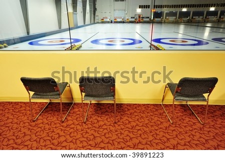 Indoor curling rinks in a sports center