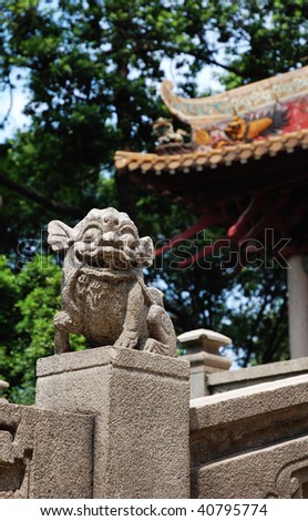 Rock monster beside the stairs by ancient chinese in a historic temple, city guangzhou, china