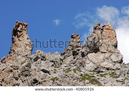 Summer view of the steep cliff and rock piles in valley of cory pass, banff national park, alberta, canada