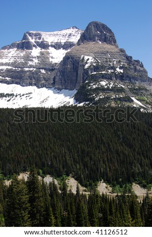 Summer view of mountain road on slope in glacier national park, montana, usa