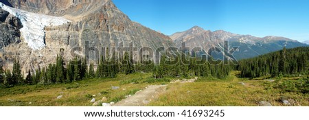 Panoramic view of canadian rocky mountains and meadows from the hiking trail beside mountain edith cavell, jasper national park, alberta