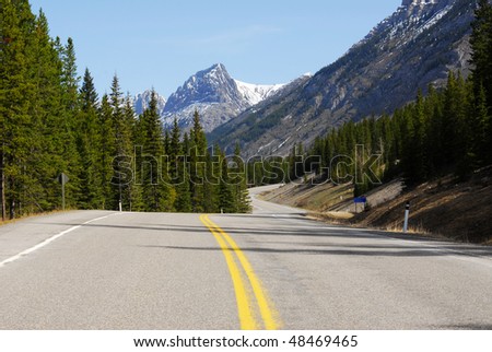 View of canadian rocky mountains in spring while driving along the highway 40 in the kananaskis country, alberta, canada