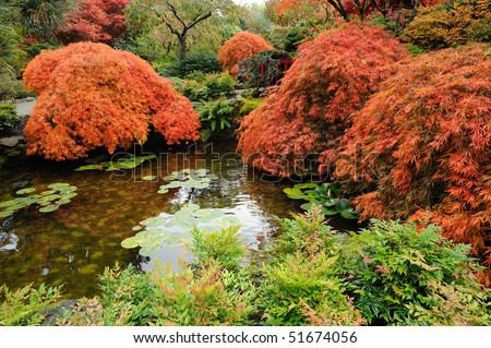 Pond of the japanese garden inside the famous historic butchart gardens (built in 1903), vancouver island, british columbia, canada