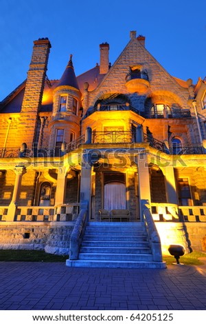 Night lighting scene of the historic craigdarroch castle (built in 1890), downtown victoria, british columbia, canada