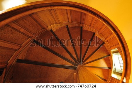 spiral stairway inside Hatley castle (built in 1908) in city colwood in vancouver island, british columbia, canada