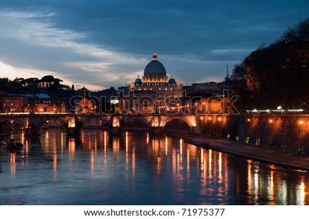 Sunset view of the Vatican with Saint Peter\'s Basilica and Sant\'Angelo\'s Bridge (Rome, Italy)