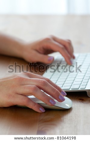 mage of female  typing on the computer keyboard