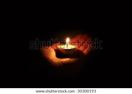 Hand Holding Candle