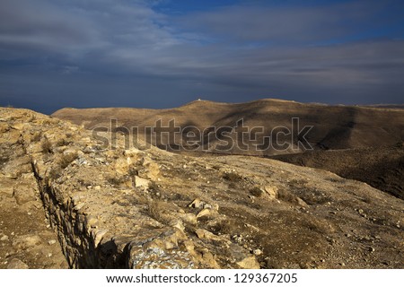 View at the River Jordan Valley and the surrounding arid hills from King Herod\'s Castle in Mukawir (Mkawer) Jordan, Arabia, Middle East