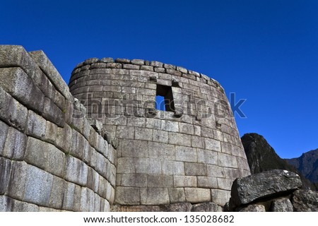 Temple of the Sun in the lost Inca city Machu Picchu, Andes mountains, Peru, South America