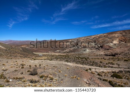 Arid and desolate landscape on the plateau in the Andes mountains in Salta province - North Argentina, South America