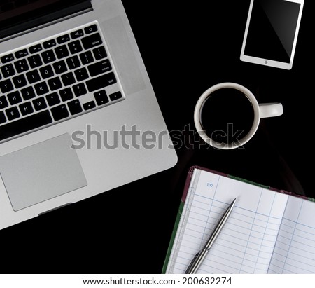 Coffee cup and laptop for business. top view
