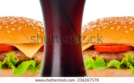 Cola and Big beautiful juicy burger with meat and vegetables. Isolated on white background