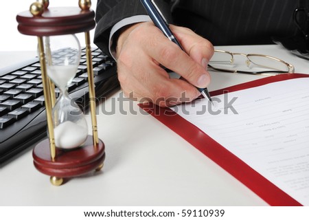 Image of businessmans hand ready to make signature