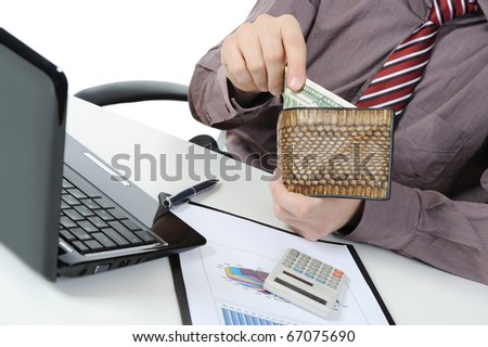 Businessman gets money from her purse. Isolated on white background