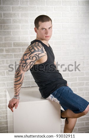 Muscular Sexy Man with tattoo