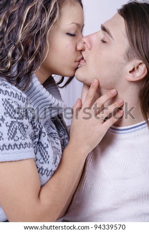 Young love couple love a real kiss