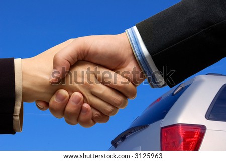 Deal! Woman and man shaking hands