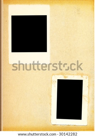 Blank page of a vintage photo album with two photo frames