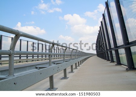 Highway with noise barrier