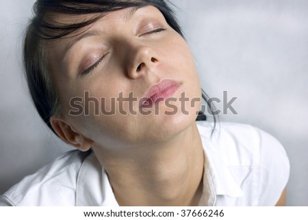 woman with eyes wide closed