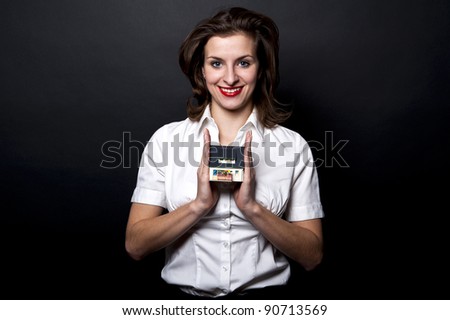 woman with miniature house