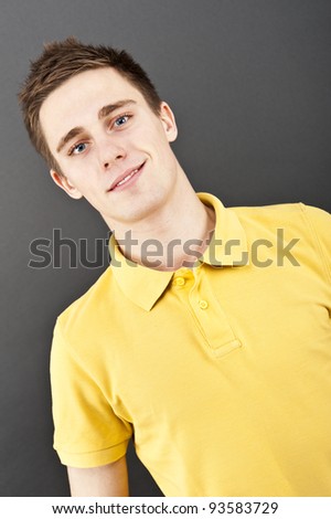 man on black background in polo shirt