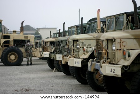 army trucks parked