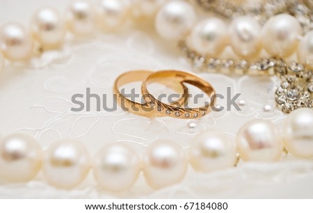 wedding rings and pearls