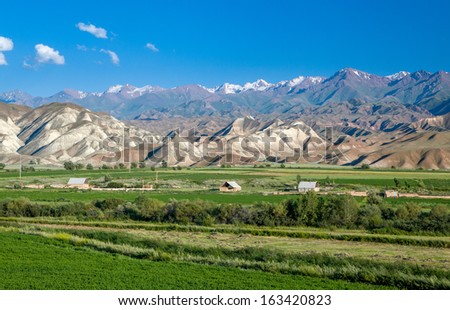 Village in bizarre scenic Tien Shan mountains, Kyrgyzstan
