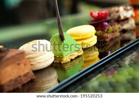 Gorgeous view of different cakes and biscuits, served in outdoors