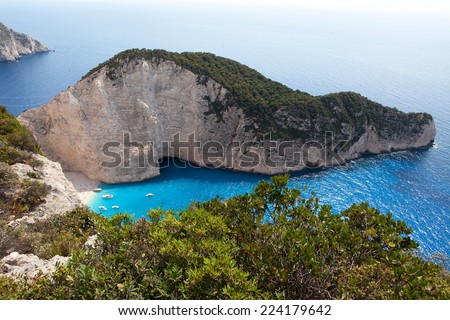 Navagio beach with sailboats in Zakynthos Island, Greece, part of Ionian Islands