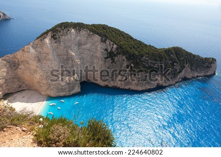 Navagio beach with sailboats in Zakynthos Island, Greece, part of Ionian Islands