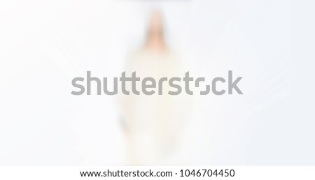 Blurred photo of Resurrection of Jesus.Jesus stand and resurrection sunday. Religious Easter background.