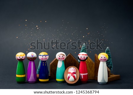 Christmas nativity scene of born child baby Jesus Christ in the manger with Joseph and Mary and Three wise men.Traditional Christmas Nativity Scene of baby Jesus in the manger with Mary and Joseph.