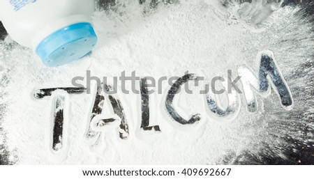 Talcum powder on black background