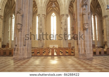 Gothic architecture with stone columns in church.