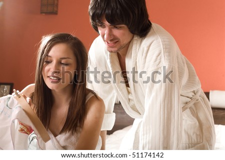 Boy in dressing gown and girl